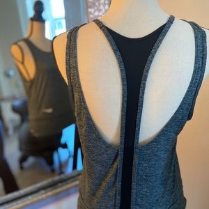 2 NWOT Nike Tanks! White and Black!